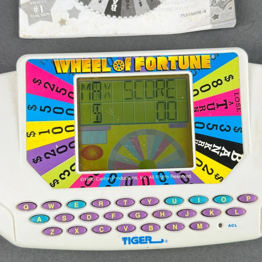 Tiger Wheel of Fortune Game 1995 Handheld Electronic Game - TESTED